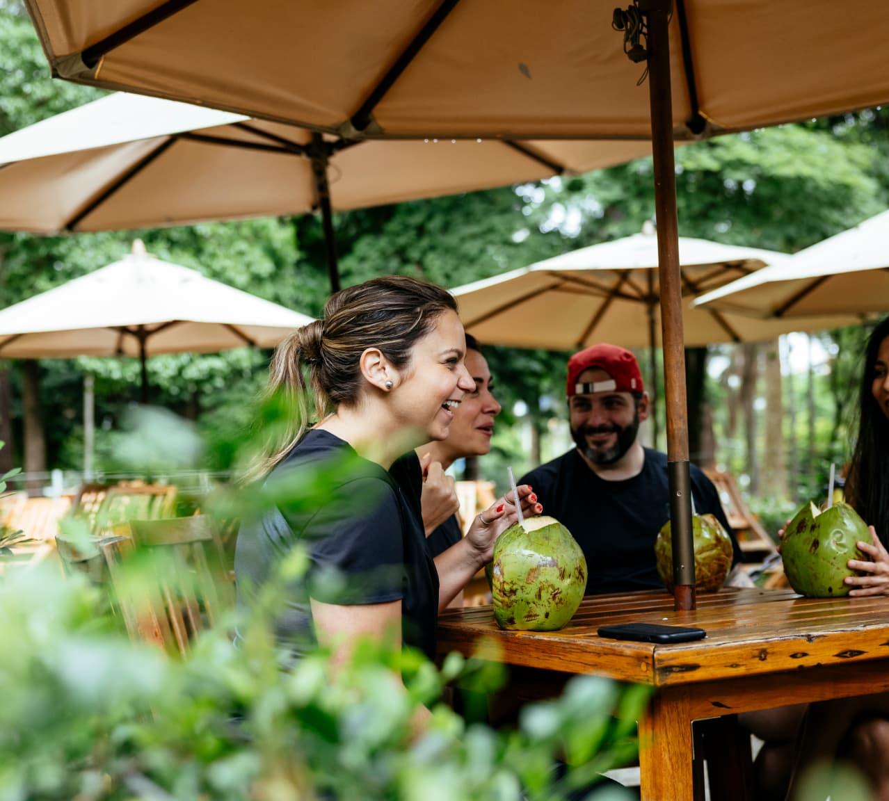 A group of people eating at a restaurant