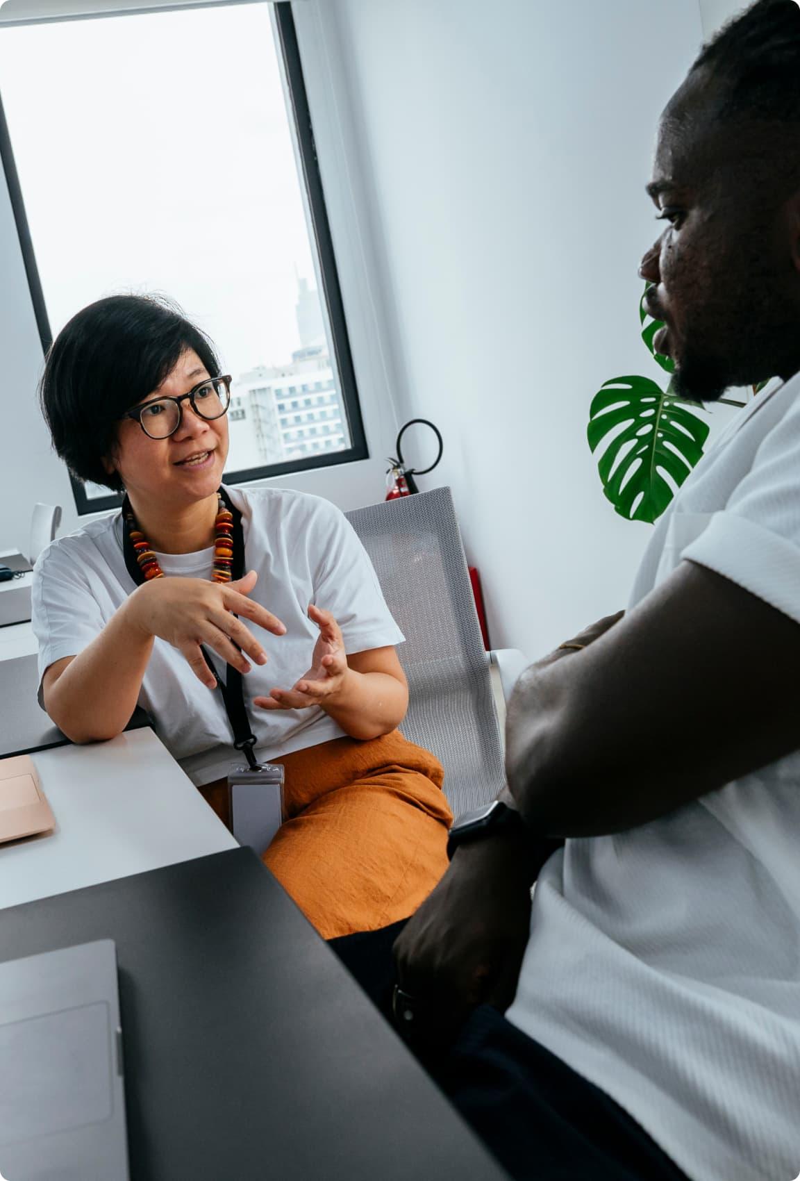 A man and a woman talking