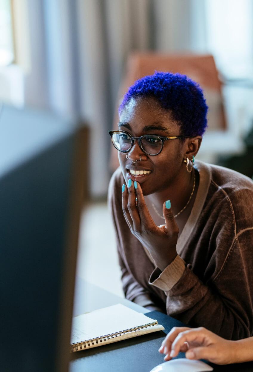 woman smiling wearing glasses