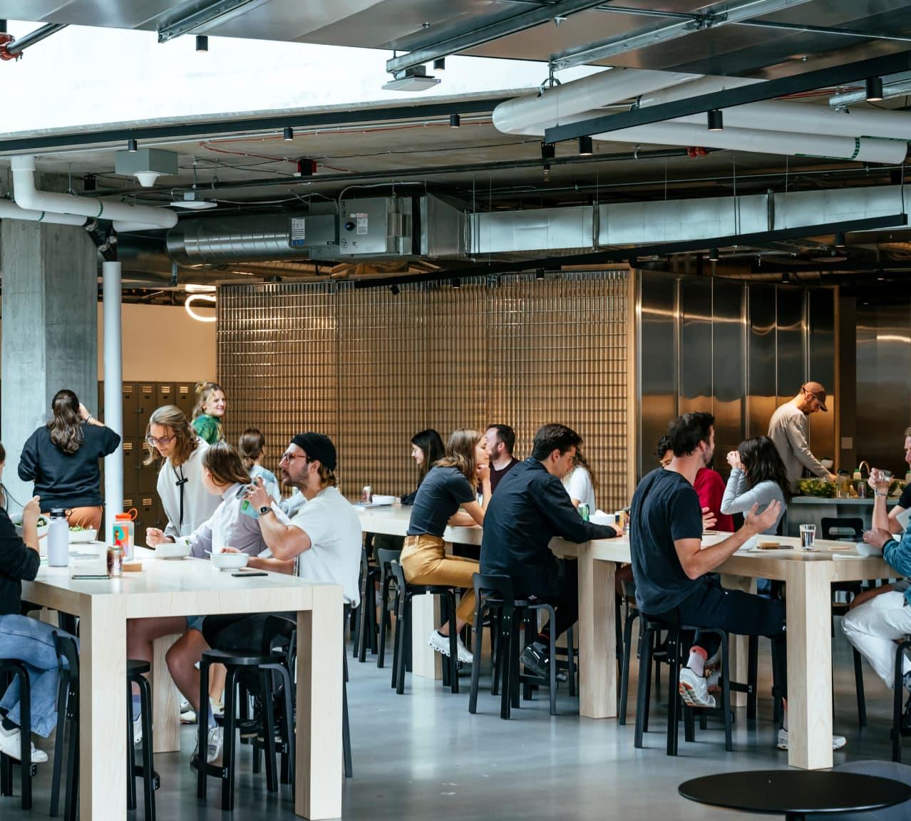 People having lunch in the office kitchen