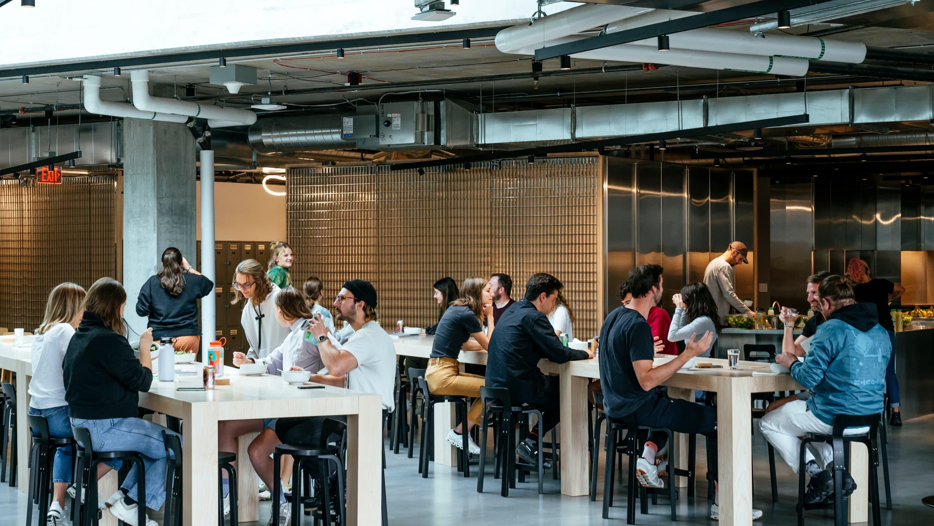 People having lunch in the office kitchen