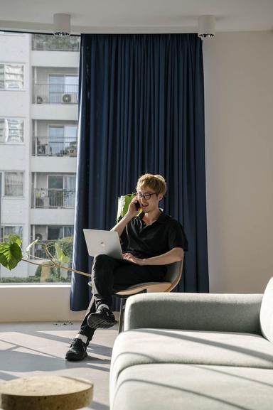 man smiling on phone