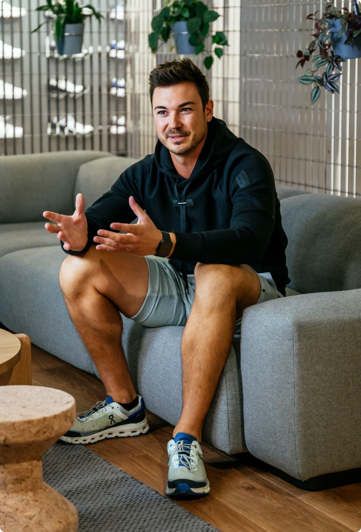 A man talking and looking towards the camera