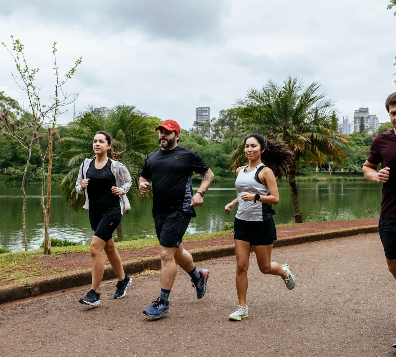 A group of people jogging in the park