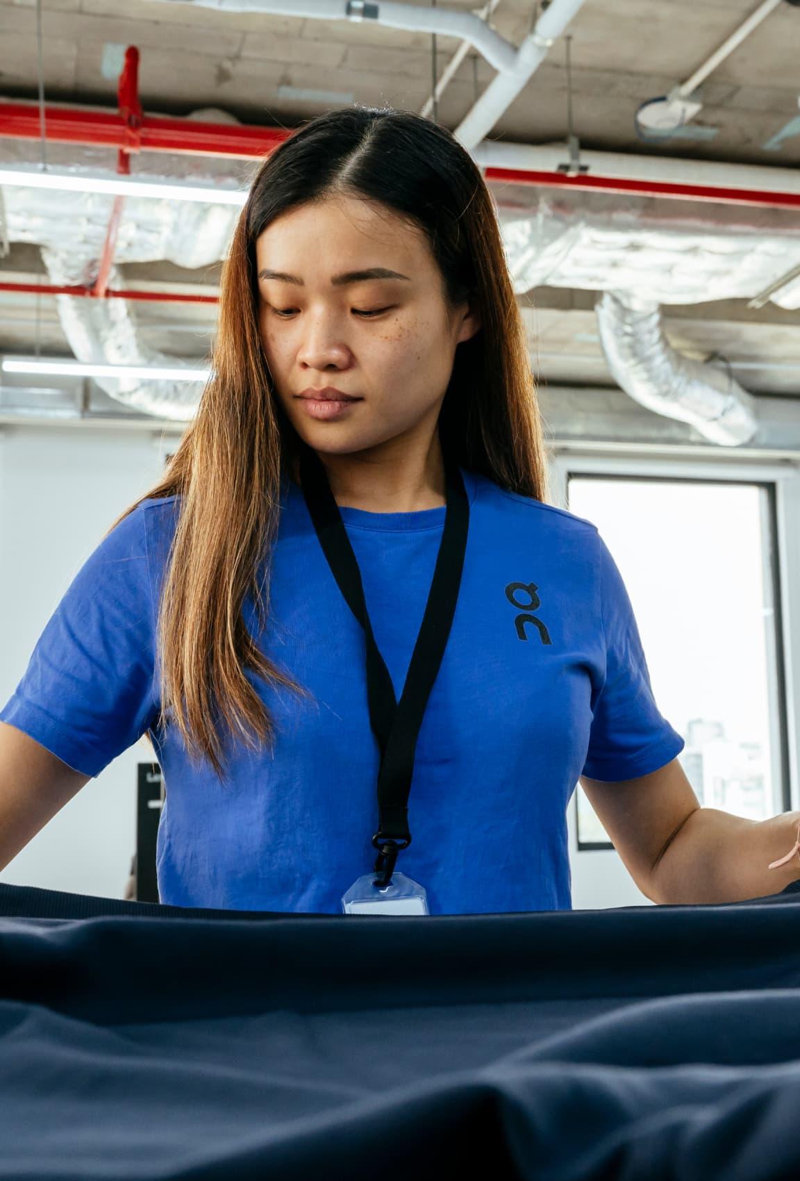 A woman working on apparel & accessory product creation