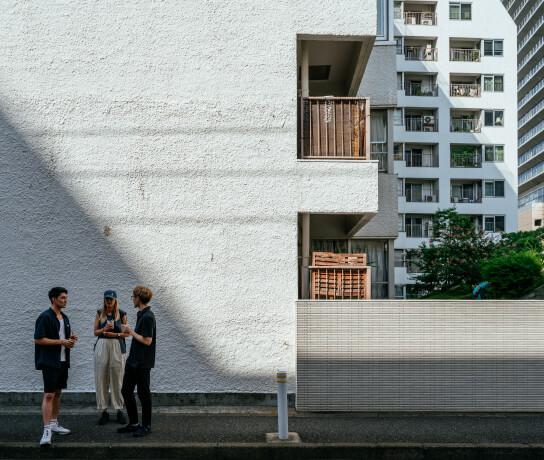 Group of people talk near the office building