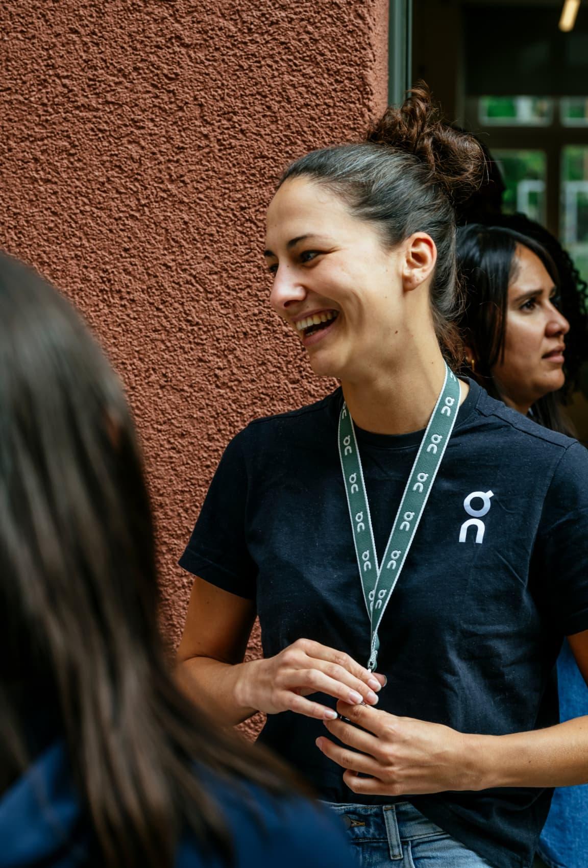 A woman laughing in a group