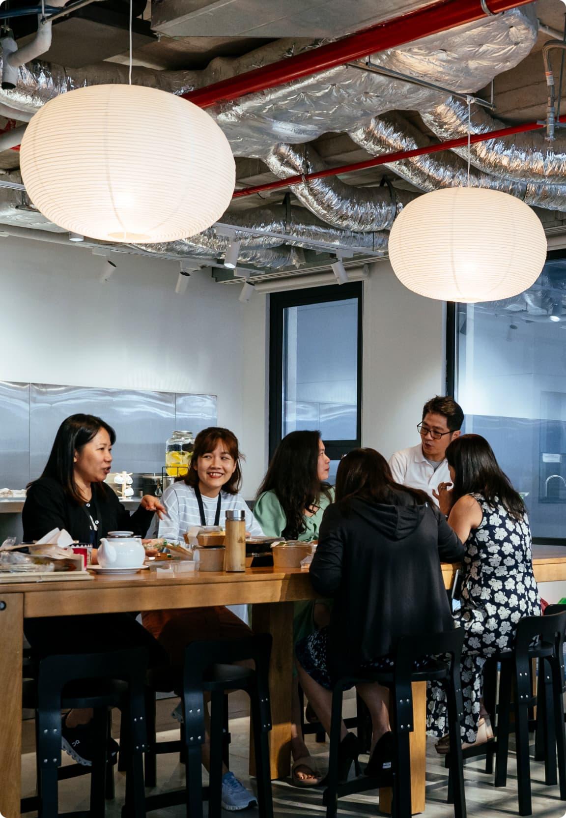A team in the Ho Chi Minh City office having lunch together.